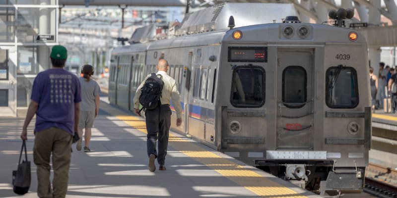Customers boarding a train at Denver Union Station