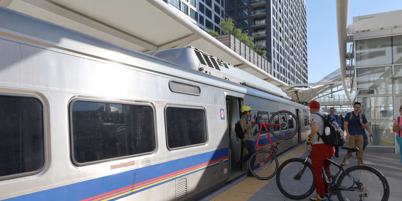 Commuters boarding the A line at Union Station with their bicycles