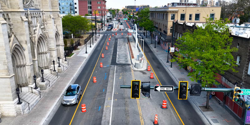 A photo of the eastbound Colfax bus platform at Pennsylvania Street.