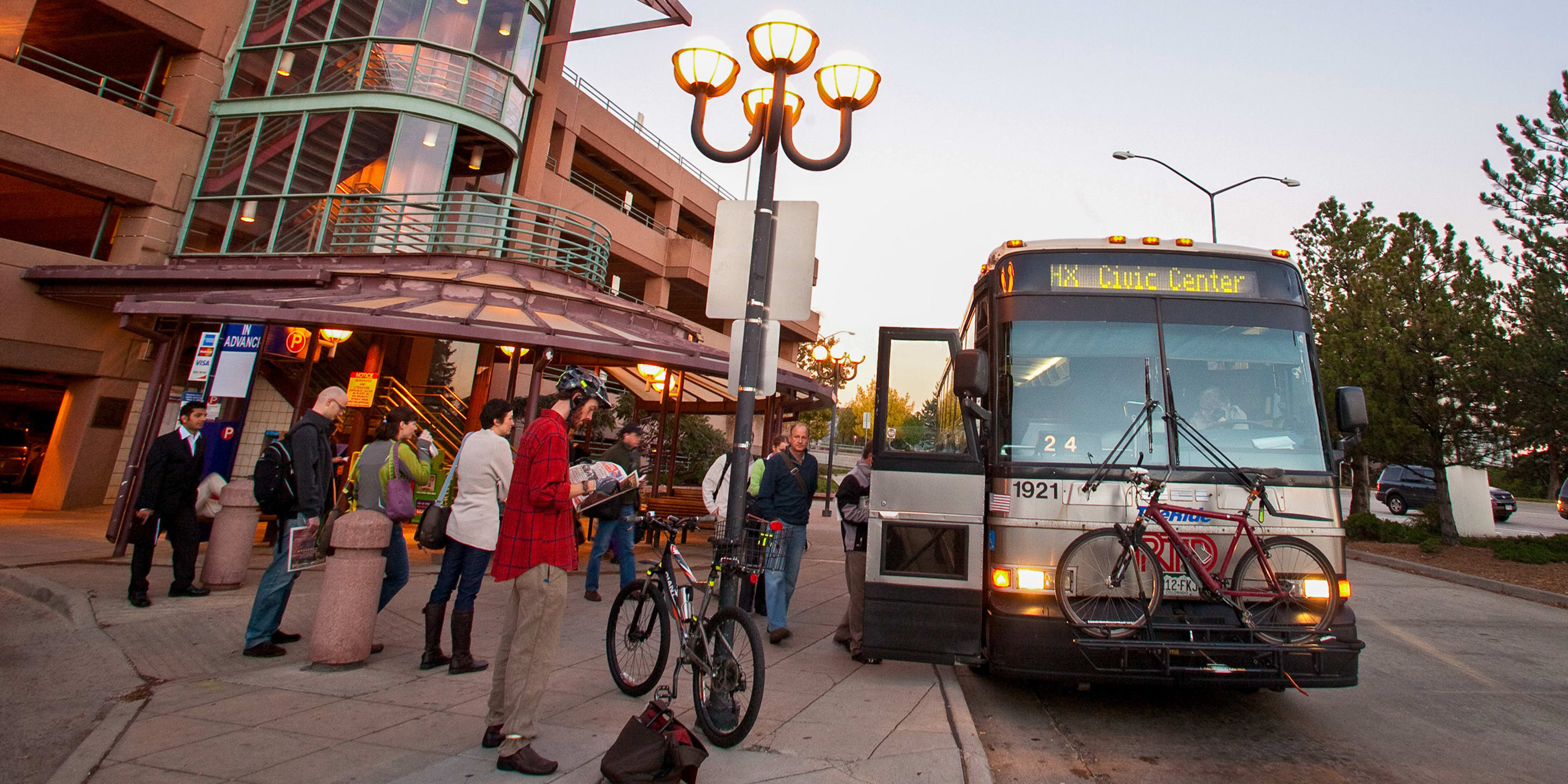 Photo of customers waiting in line to board the bus