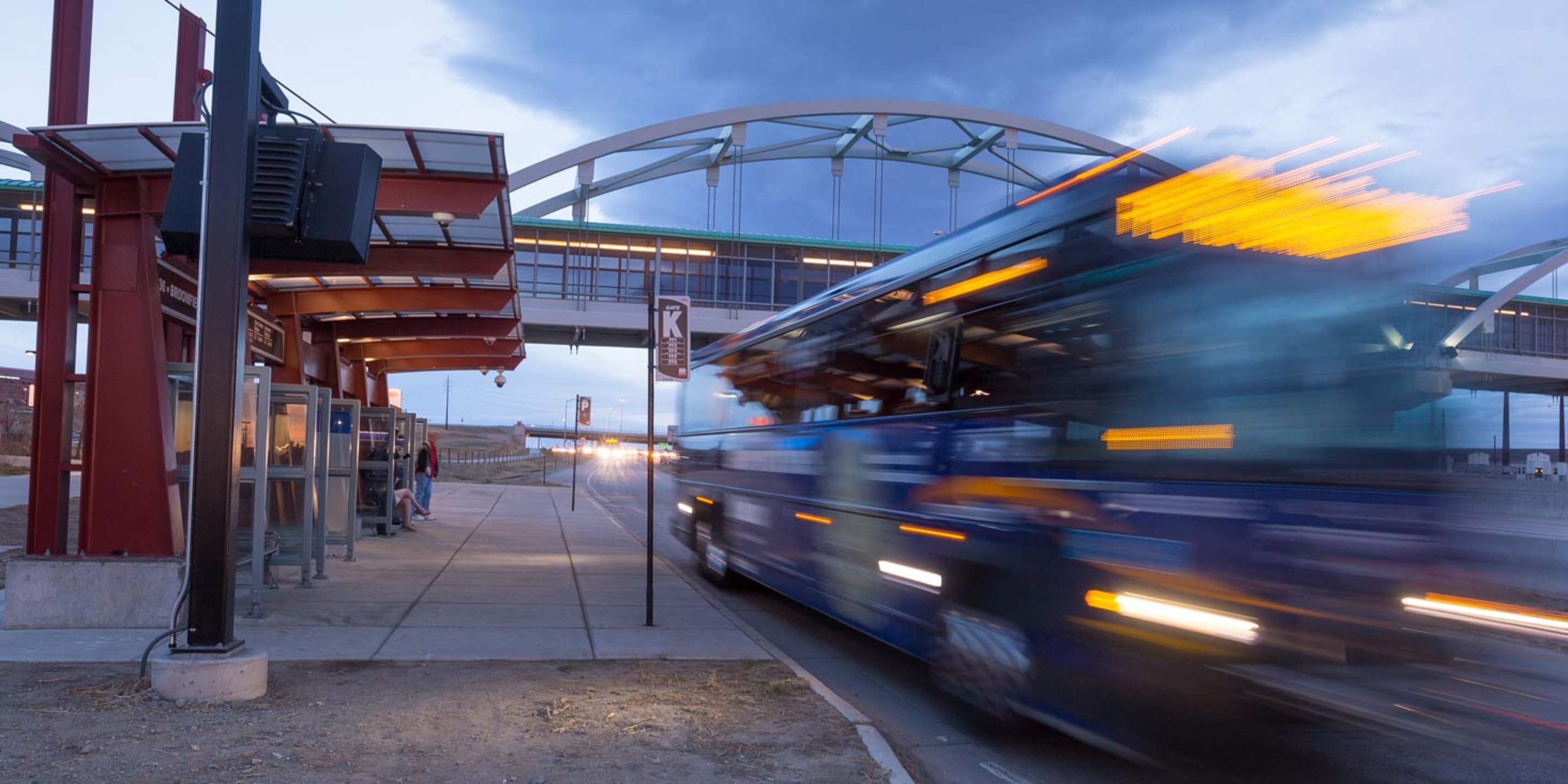 A Flatiron Flyer bus leaving the bus stop