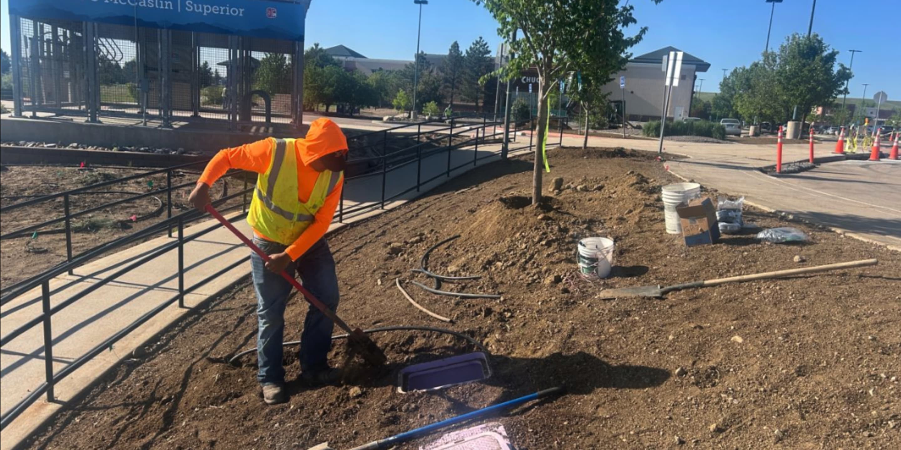 Worker at the US 36 and McCaslin Station