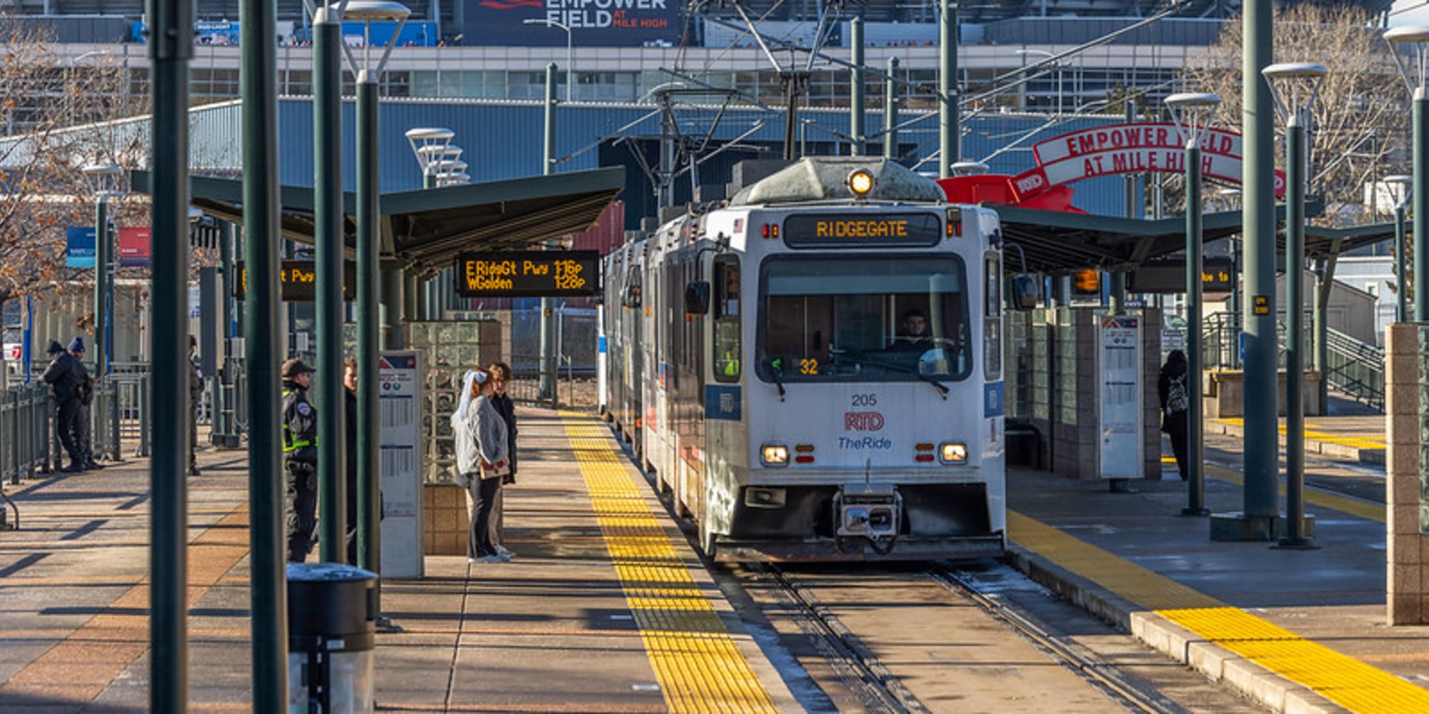Light Rail vehicle stopped at Empower Field at Mile High Station