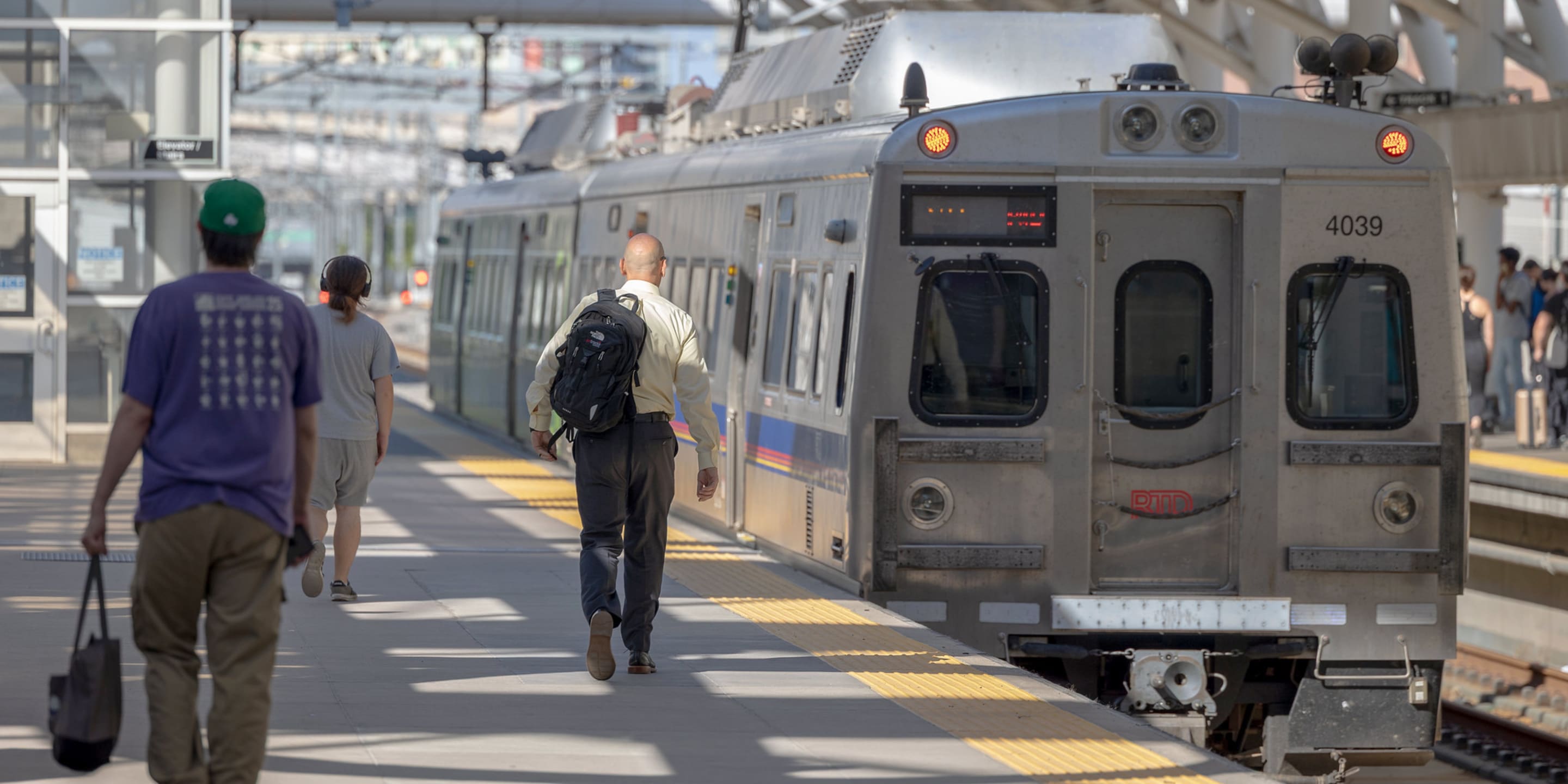 Customers boarding a train at Denver Union Station