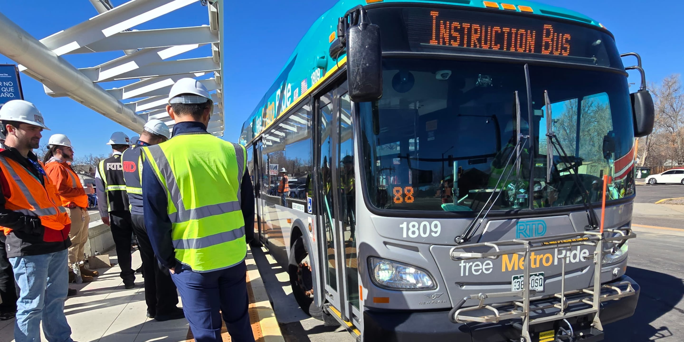 Test bus on Colfax BRT with testing staff