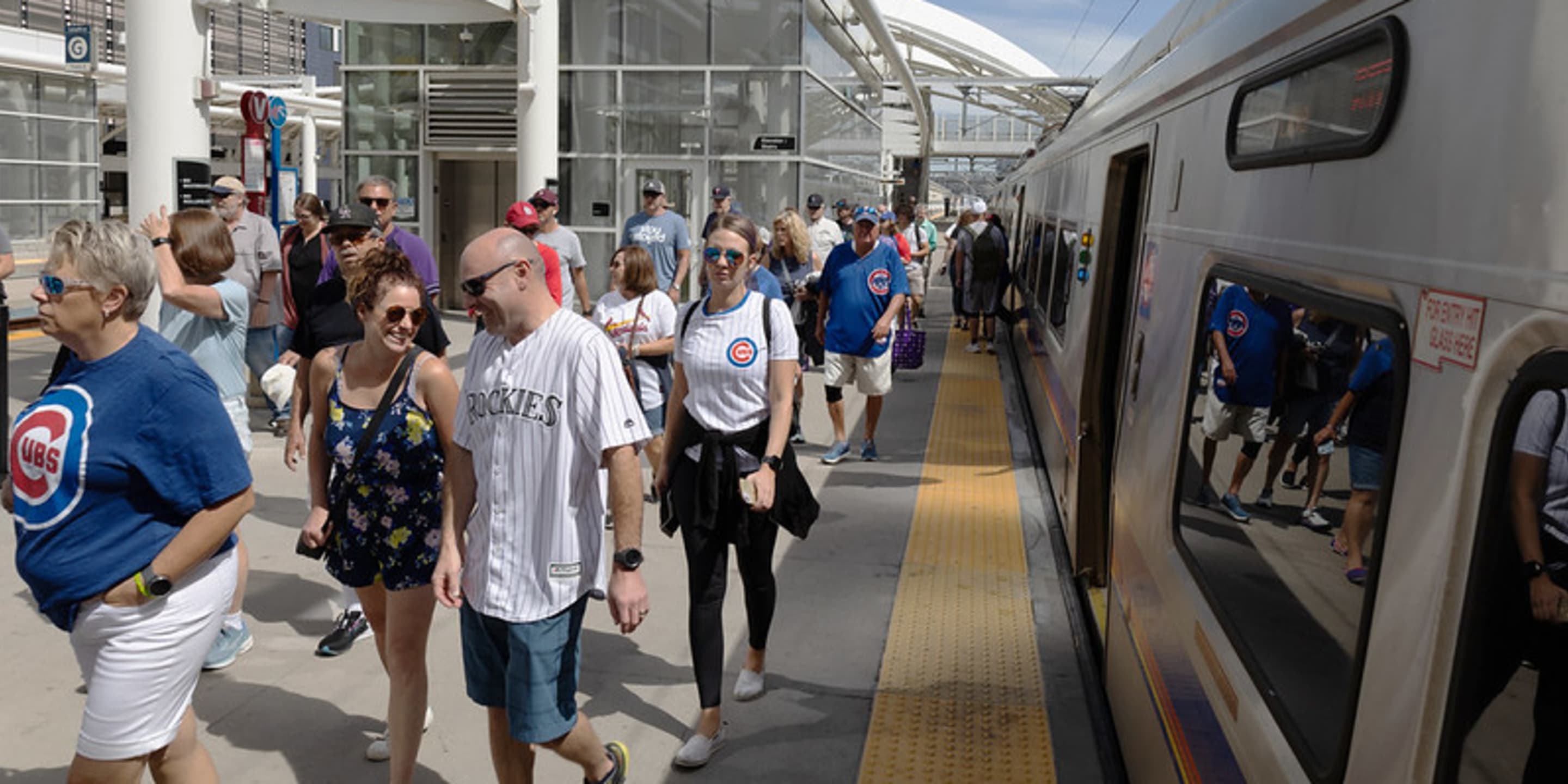 A photo of people walking on the platform at Union Station