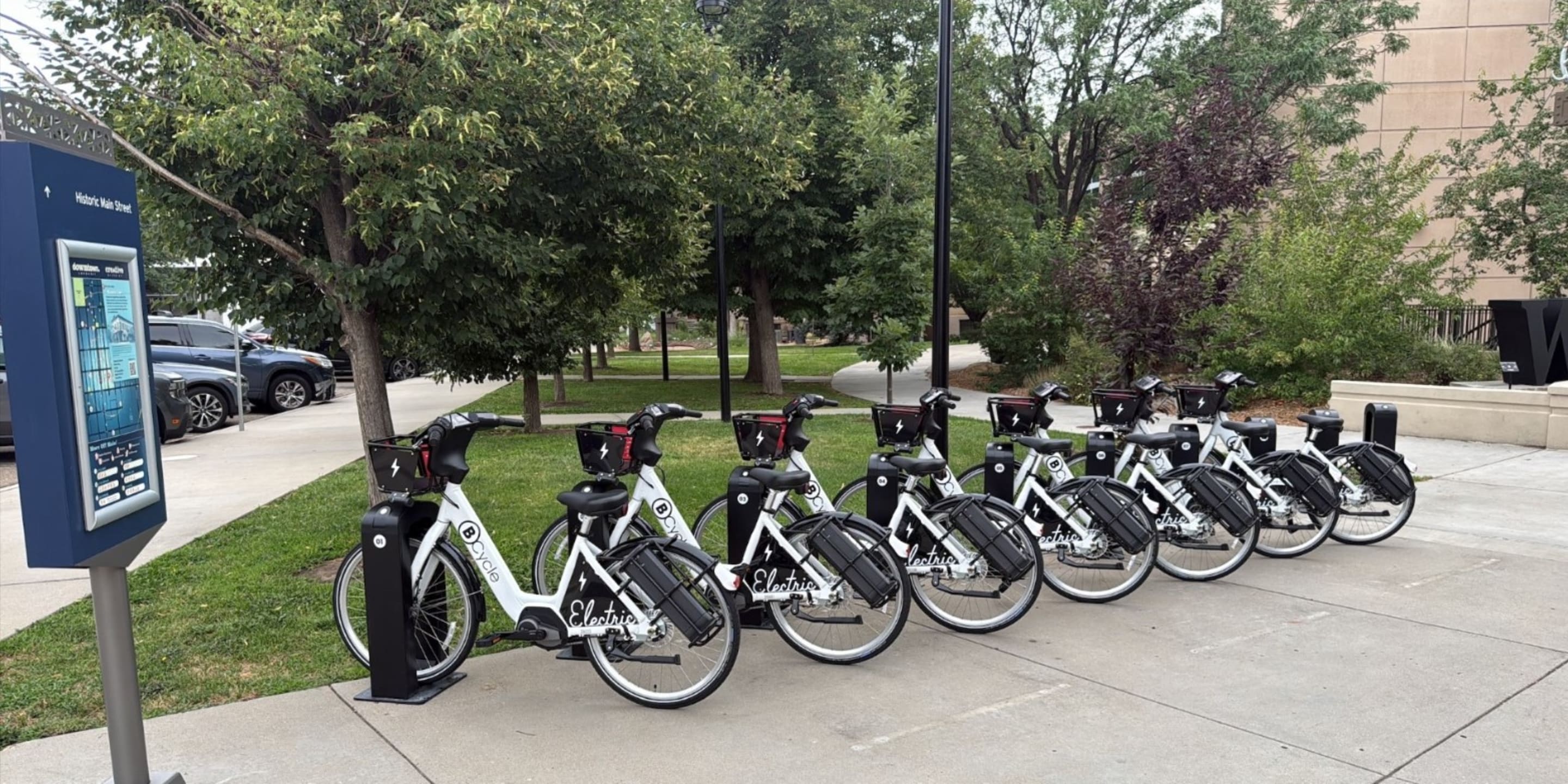 A photo of B Cycle bikes parked in bike racks at Coffman Street Station