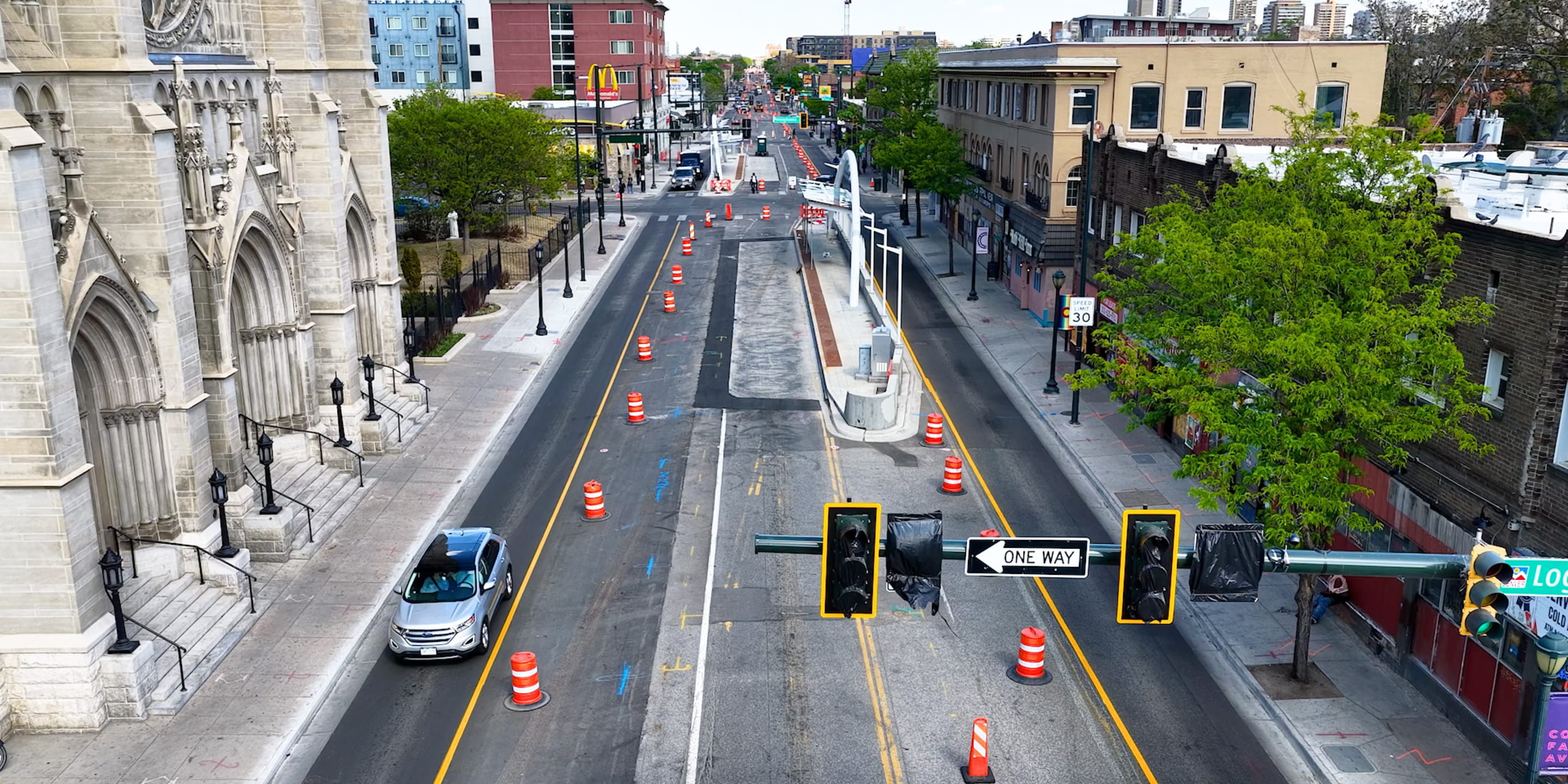 A photo of the eastbound Colfax bus platform at Pennsylvania Street.