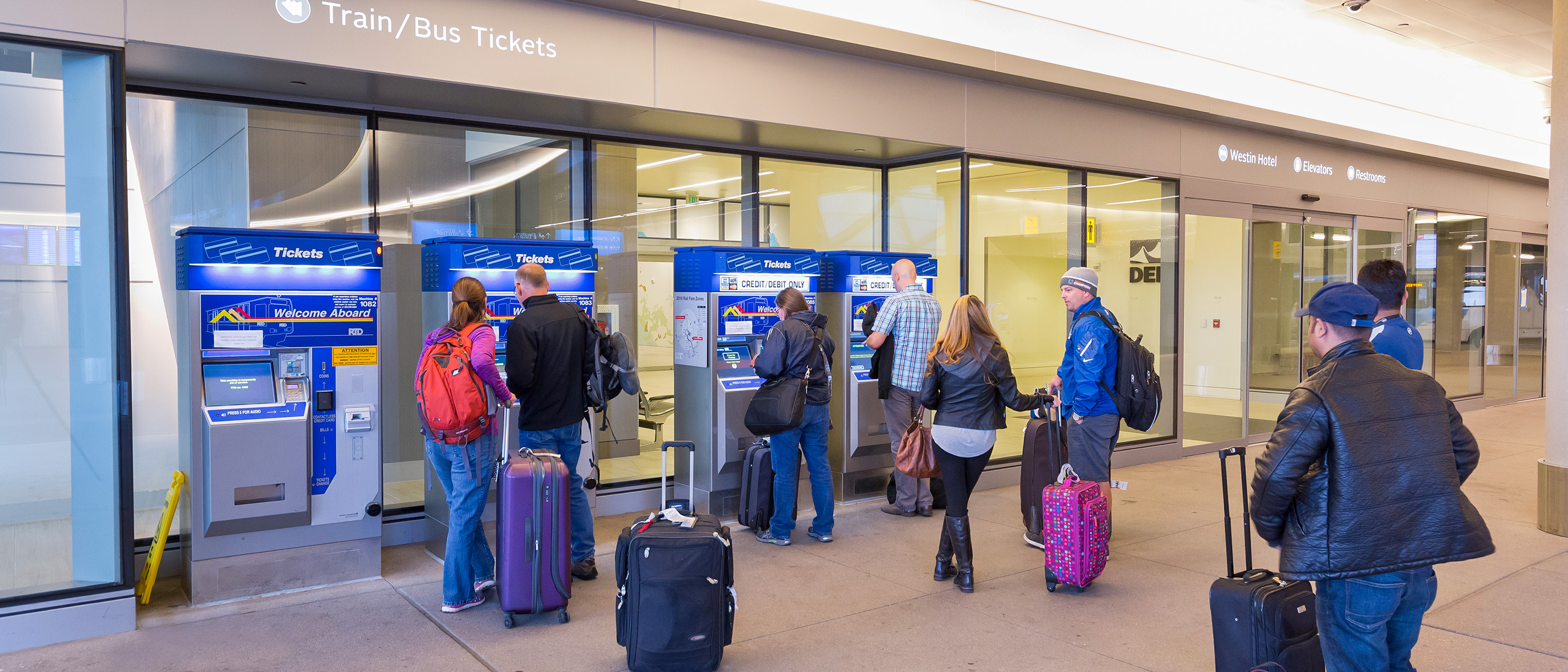 Customers in line to purchase a ticket at the airport