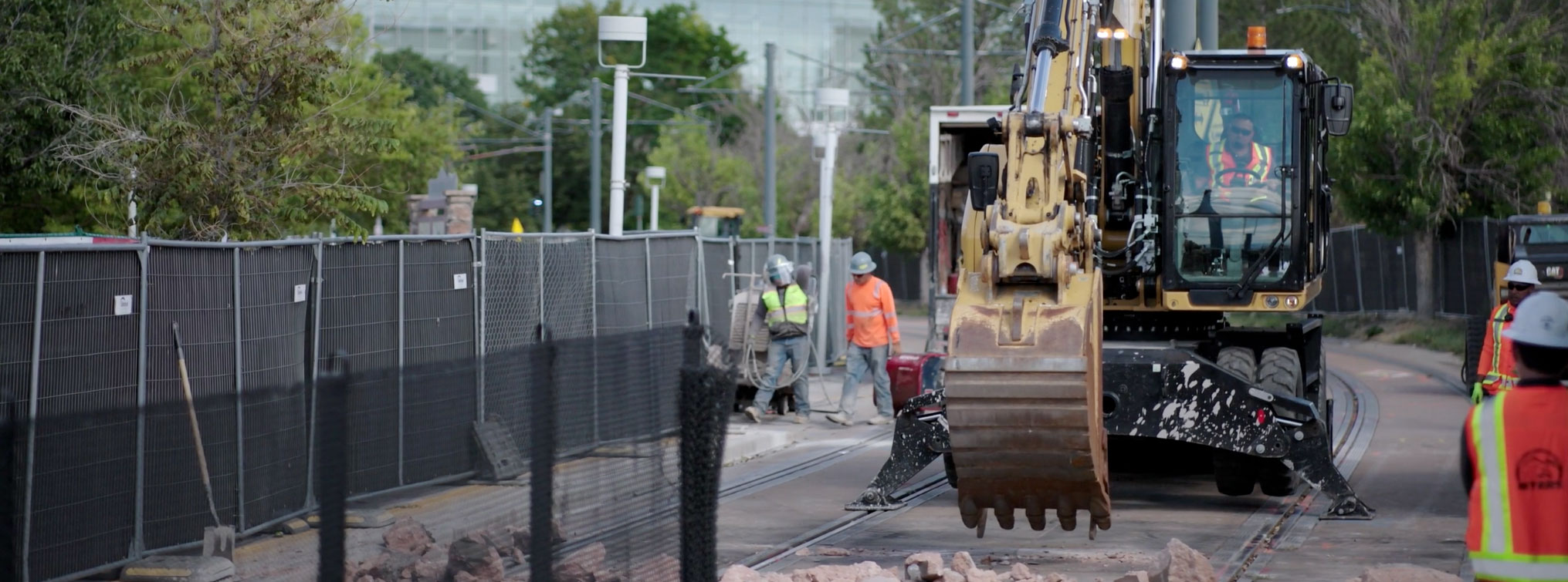 Construction crews removing track near the Colfax at Auraria Station as part of the Downtown Rail Reconstruction Project