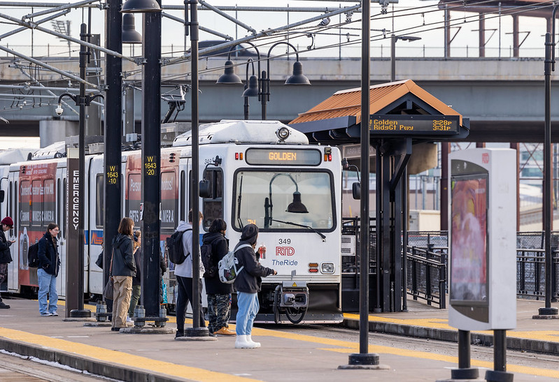 W Line with customers at platform
