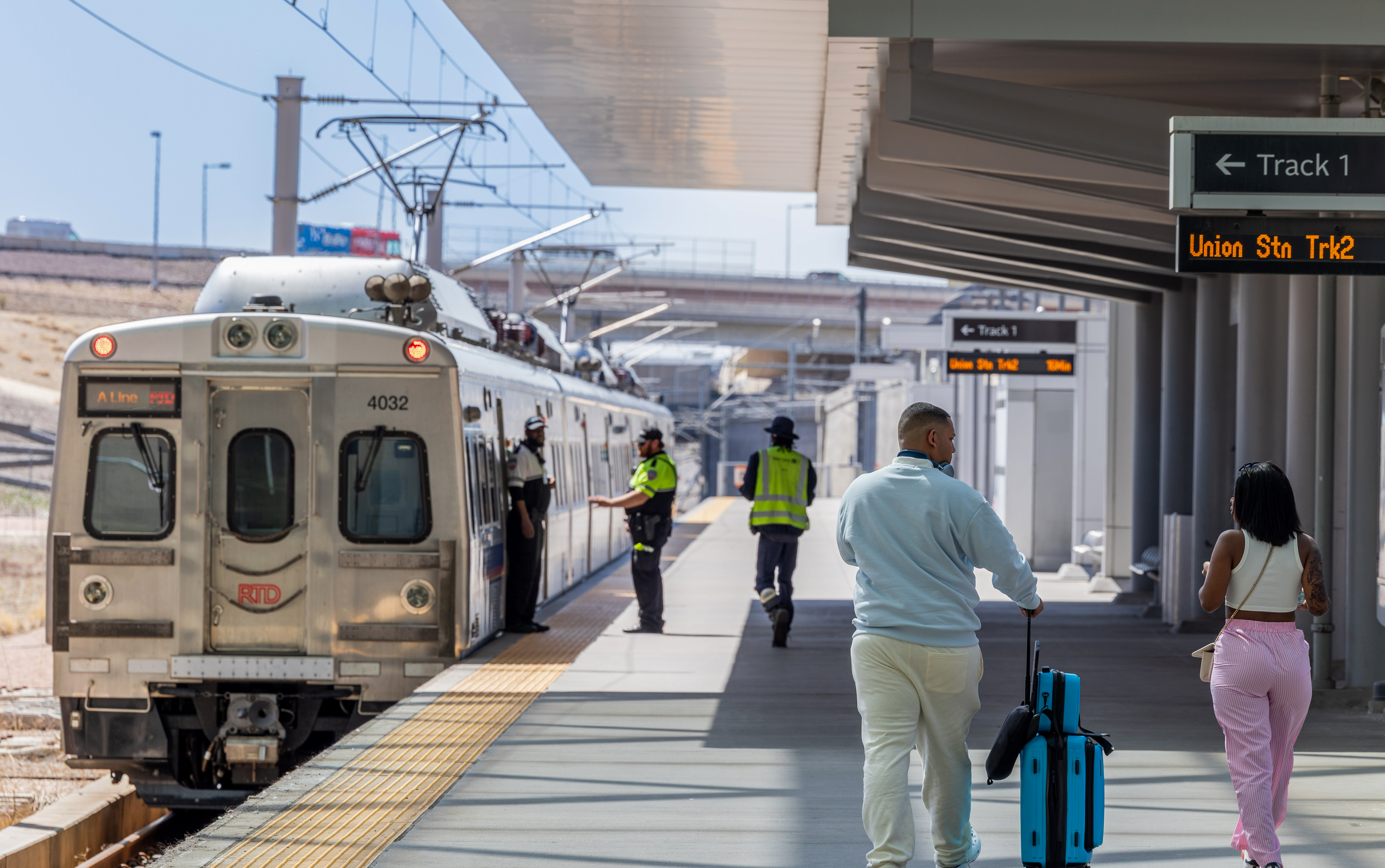 Customers boarding an A Line Train