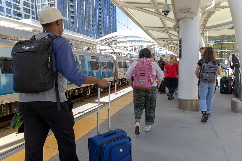 Customers boarding A Line with luggage