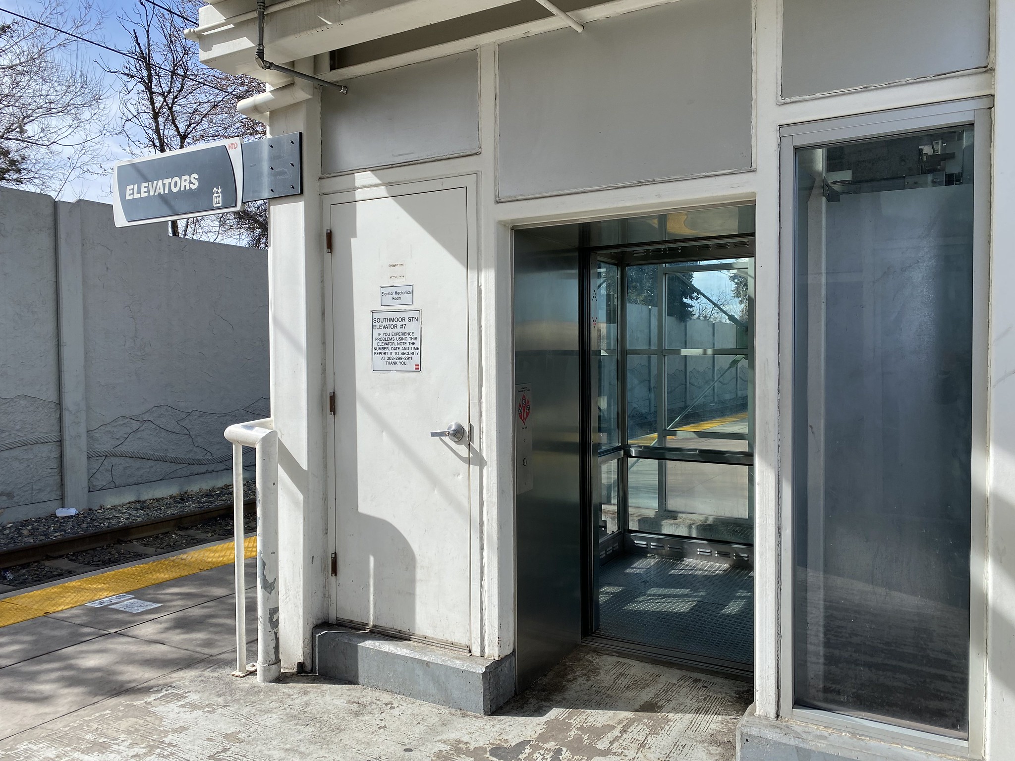 Open elevator door at light rail station